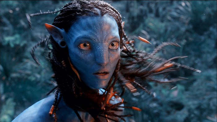 Neytiri from Avatar in a forest