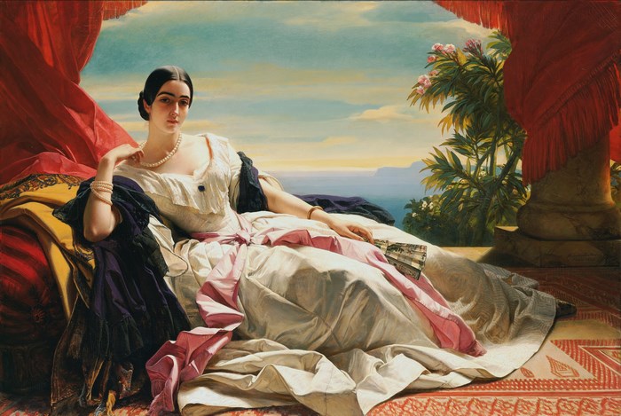 Woman in white dress with pearls and fan