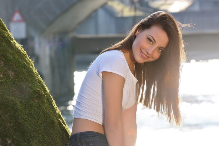 Cool Lorena Garcia Smiling Outdoors by Water and Bridge