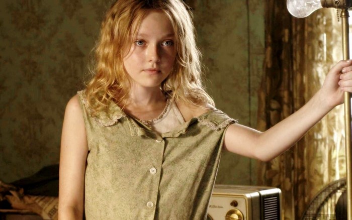 Dakota Fanning in Vintage Room with Lamp