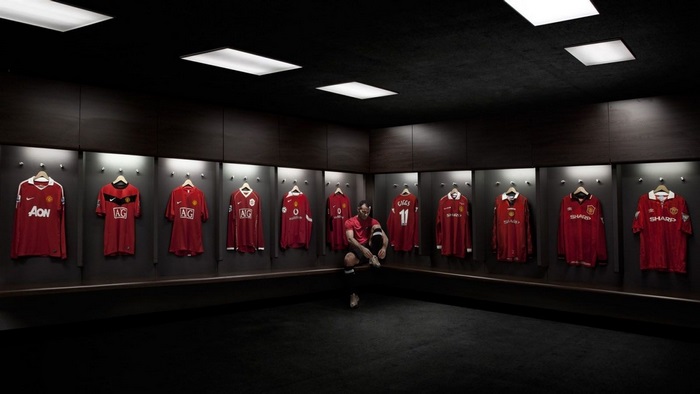 Manchester United football shirts in locker room