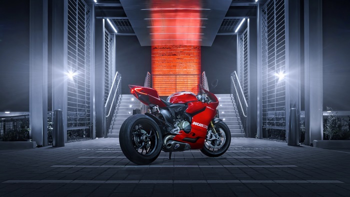 Red Ducati motorcycle on stairs 4K