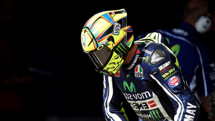 Valentino Rossi in his racing suit and helmet