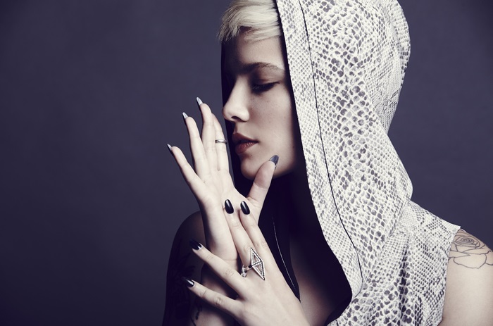 Halsey in a snake print hood