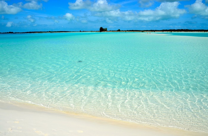 Turquoise ocean and white sand beach in paradise