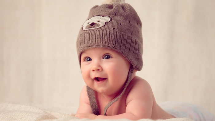 Cute baby wearing a bear hat, 4K