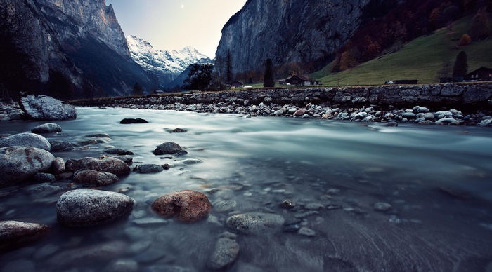 River flowing through mountains in Switzerland 4K
