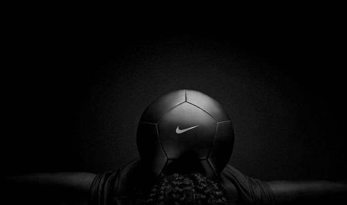 4K Black Nike Soccer Ball with Outstretched Arms