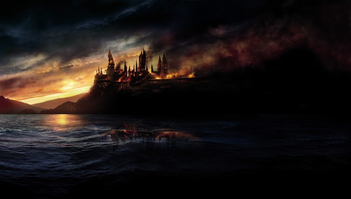 Hogwarts Castle on fire at sunset
