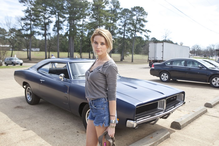 Amber Heard in a vintage car