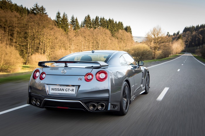 Nissan GT-R driving on a road