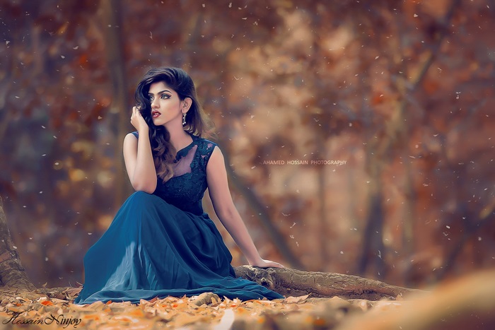 Model in blue dress in autumn forest 4K