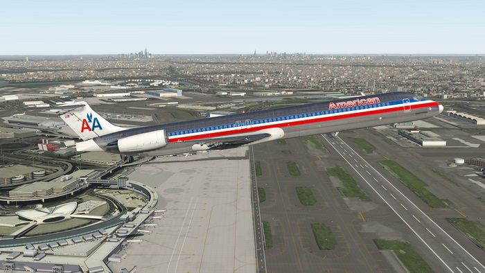 American Airlines airplane taking off from airport with city skyline