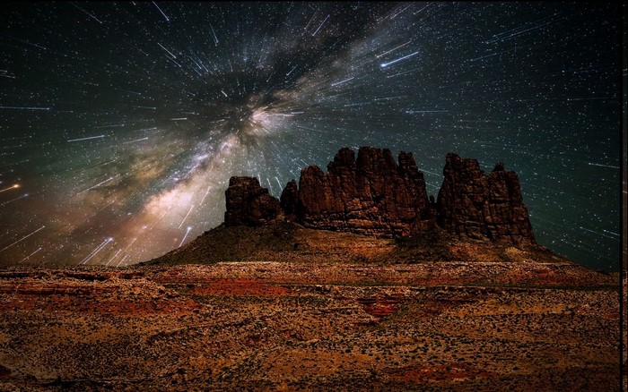 Starry Night Over Desert Landscape with Milky Way