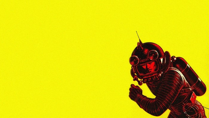 Vintage astronaut in a red space suit on a yellow background