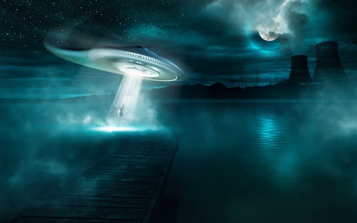 UFO abducting a person from a dock at night