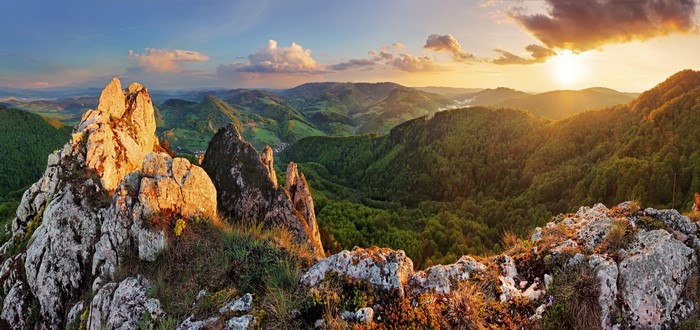 Sunset Over Rocky Mountain and Verdant Hills