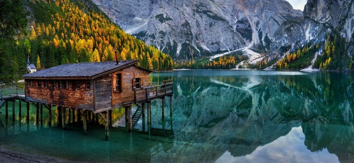 Mountain Lake Cabin with Autumn Forest Reflection