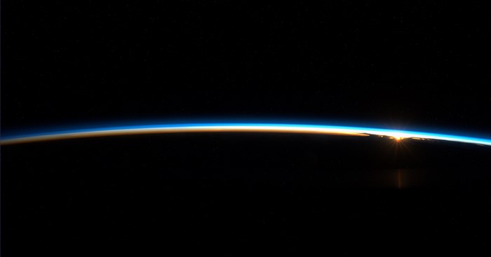 Earth's atmosphere at sunrise from space