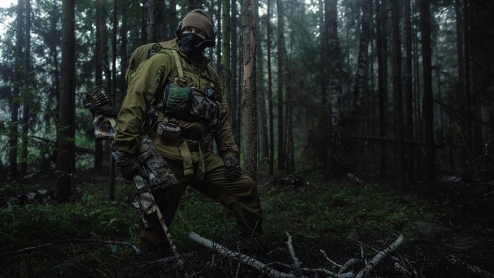 Russian Spetsnaz soldier with sniper rifle in forest