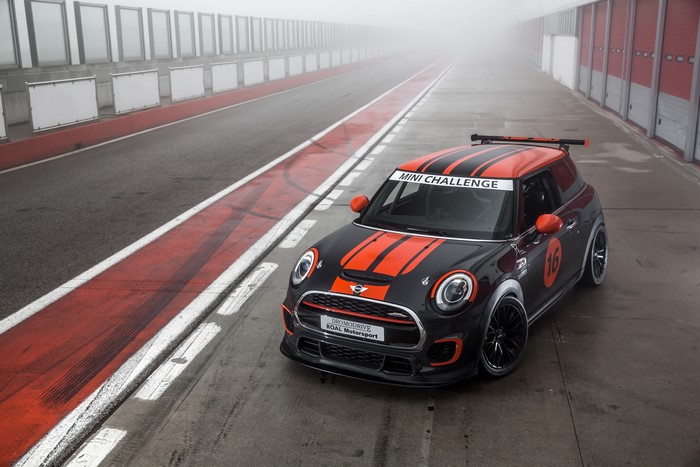 Mini Challenge race car on a foggy track