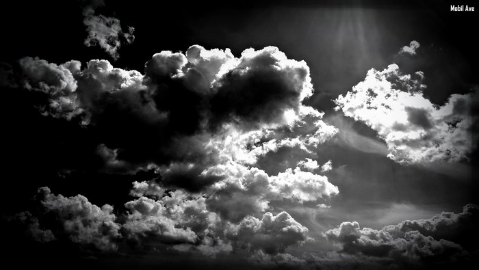 Dark clouds in a monochrome sky