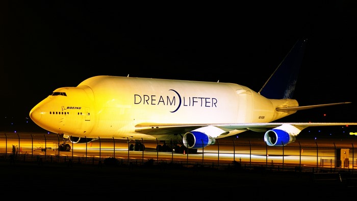Boeing Dreamlifter 747 cargo plane at night