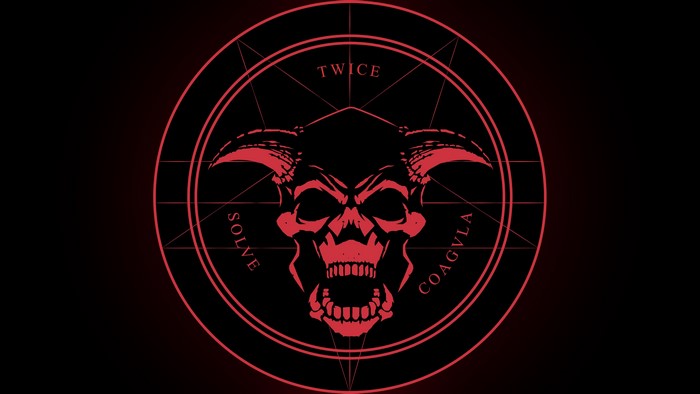 Red demon skull with horns and Latin text