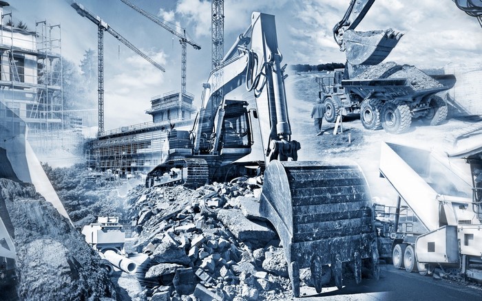 Construction site with excavators and cranes