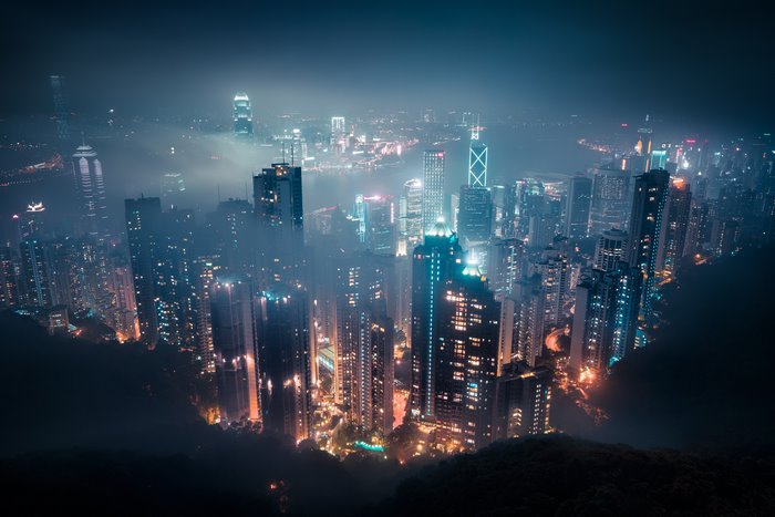 Hong Kong cityscape at night with mist