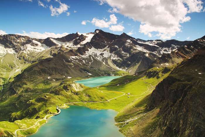 Aerial view of alpine lakes and mountains in Ceresole Reale, Italy