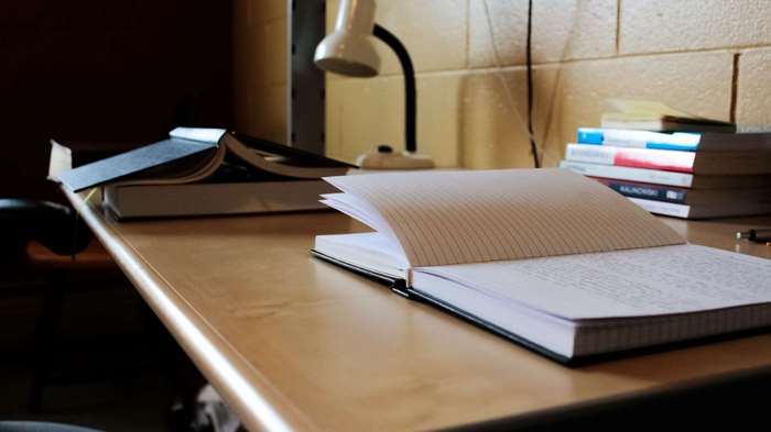 Books and lamp on a desk
