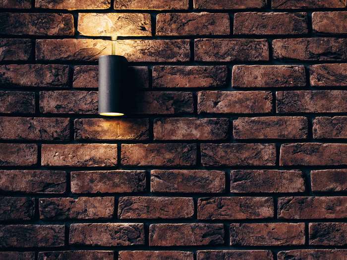 Wall lamp on a brick wall
