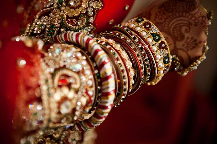 Indian Bride's Hands with Bangles and Henna