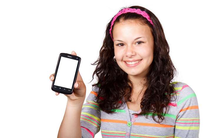 Young woman holding a smartphone