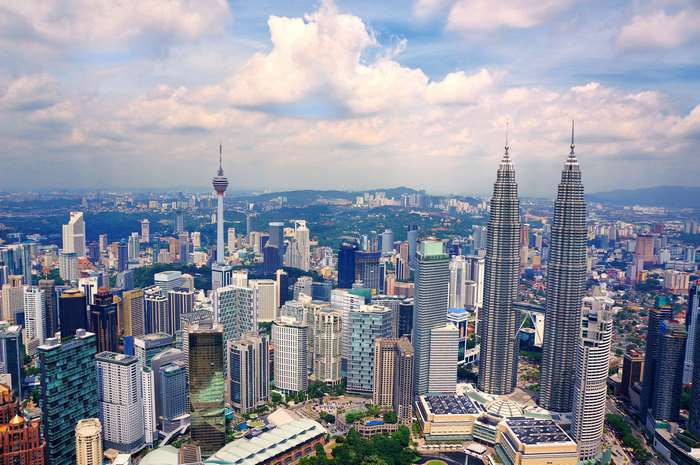 Kuala Lumpur cityscape with Petronas Towers and KL Tower