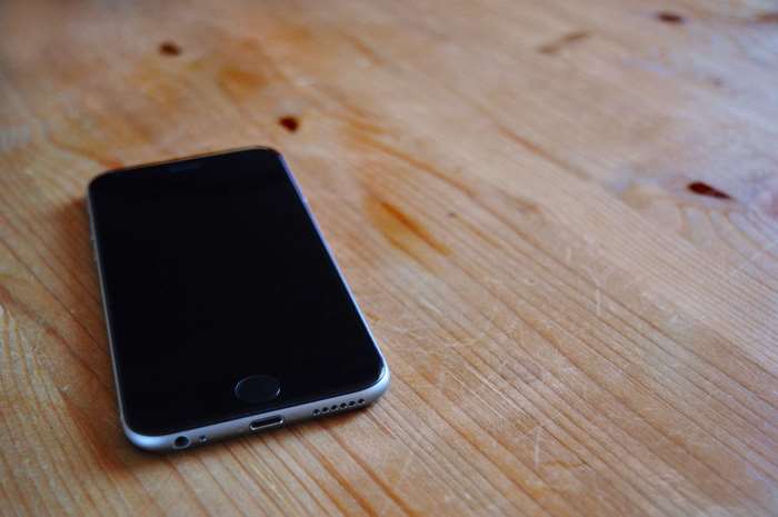 iPhone 6 on a wooden table
