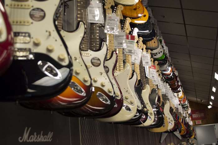 Electric guitars hanging in a music store