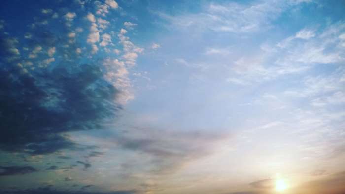 Blue sky with clouds and sun 4K