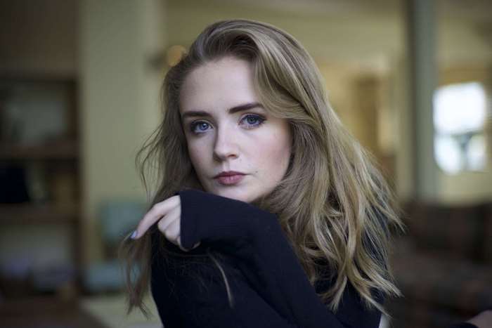 Young woman with blue eyes and blonde hair