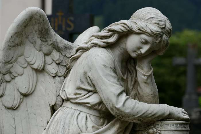 Stone angel sculpture in a cemetery