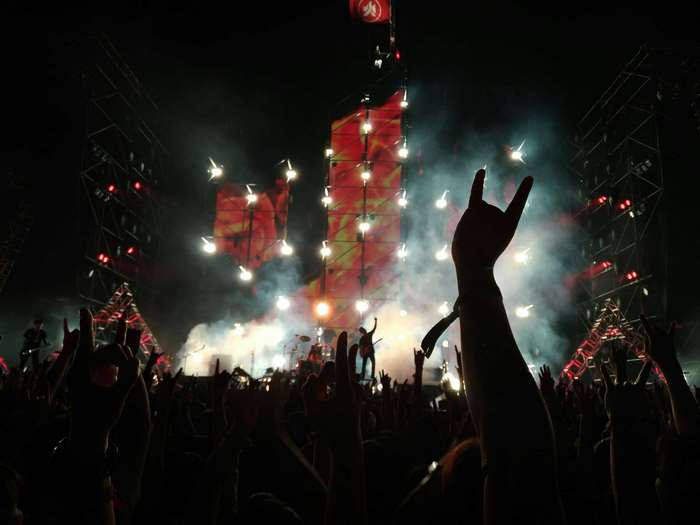 Rock concert with audience and band on stage