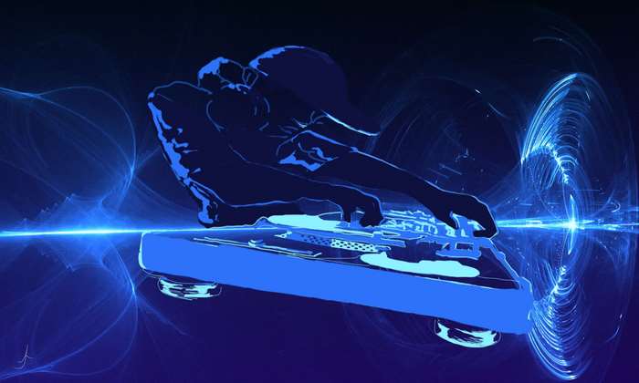 Silhouette of a DJ performing on twin decks with blue abstract lights