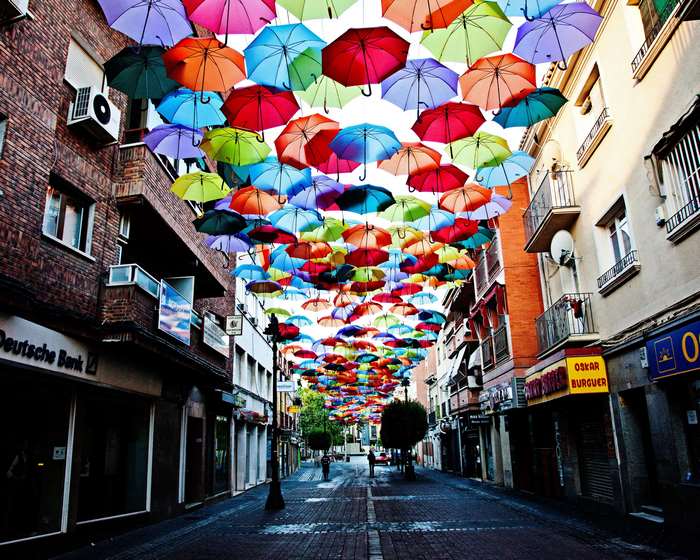Street decorated with colorful umbrellas in Spain