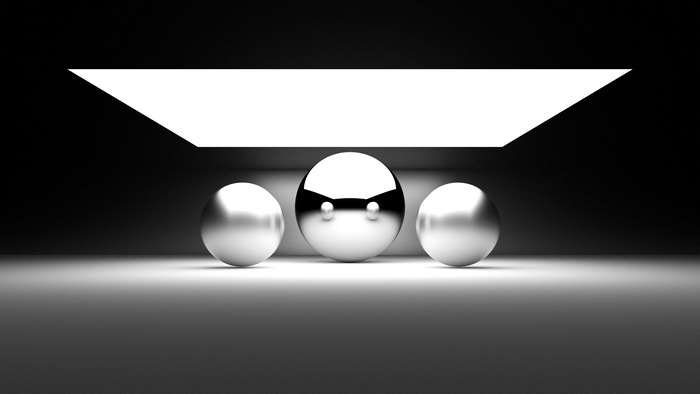 Three chrome spheres under a light source