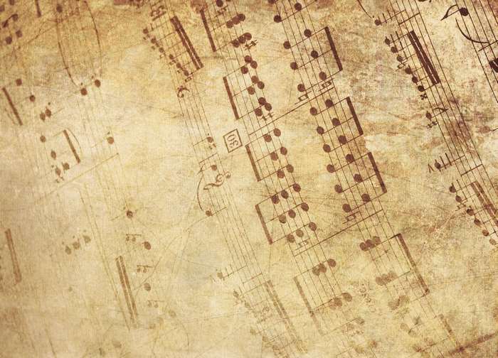 Old sheet music with musical notes