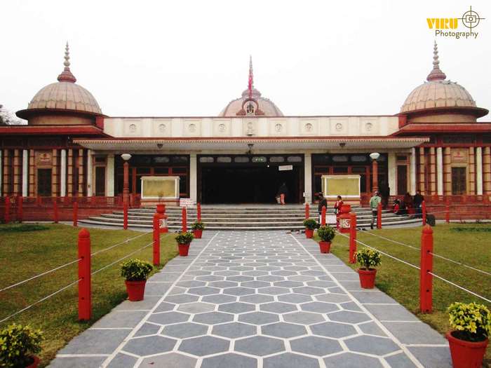 Mohannagar Temple with a paved walkway and garden