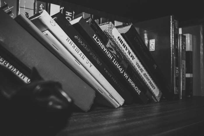 Books on a bookshelf in monochrome