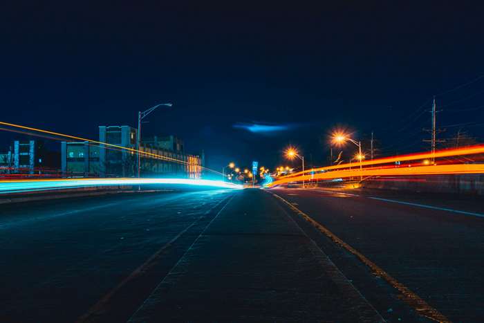 Long exposure of city highway at night with light streaks