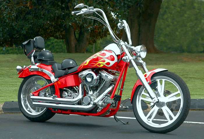 Red custom chopper motorcycle with flame decals